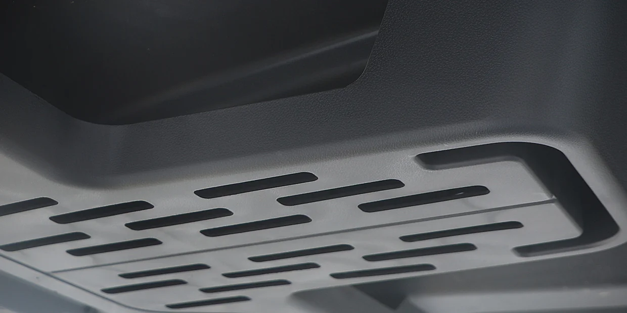 automobile class features overhead storage compartment